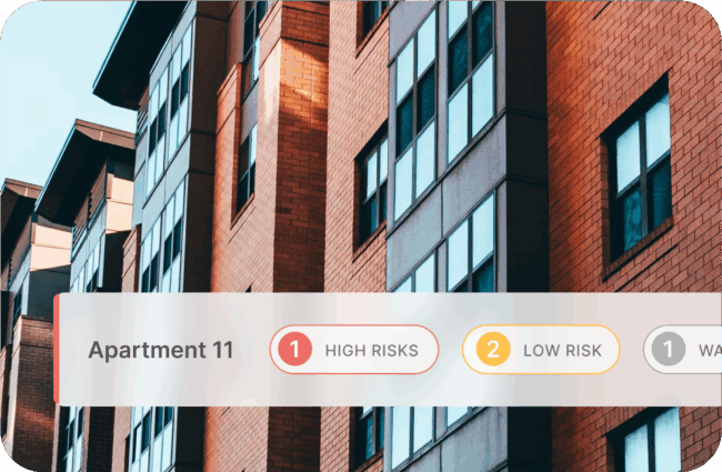 Interface of a Watergate system that offers real-time monitoring and instant alerts for all properties, set against an image of a modern block of flats.